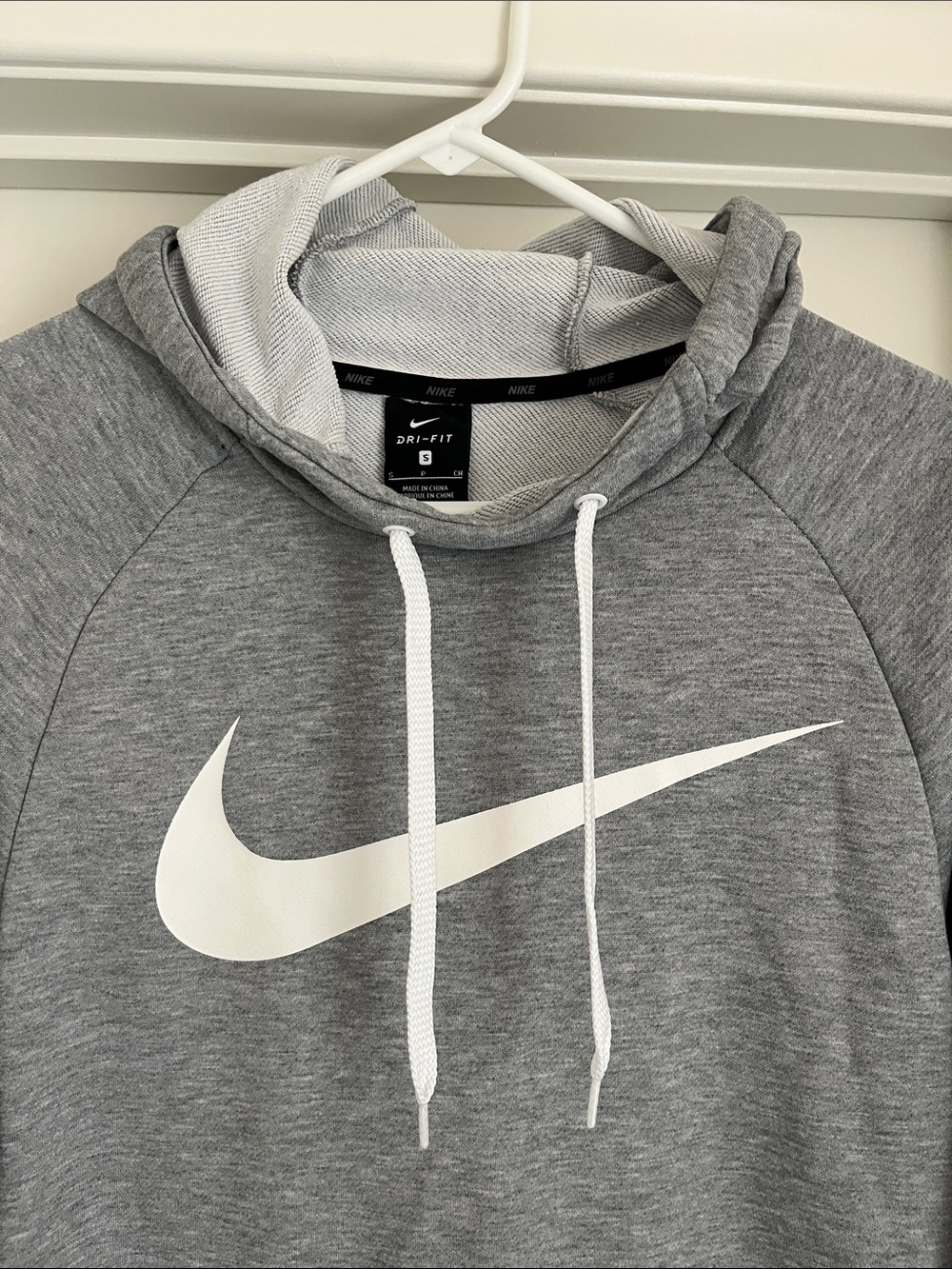 Nike Gray Hoodie with White Swoosh and Drawstrings